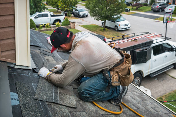 Professional Roofing technician working in Pompano Beach, FL